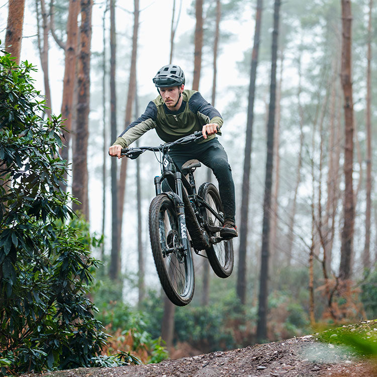 riding teewing flux one ebike jump through mauntain trails
